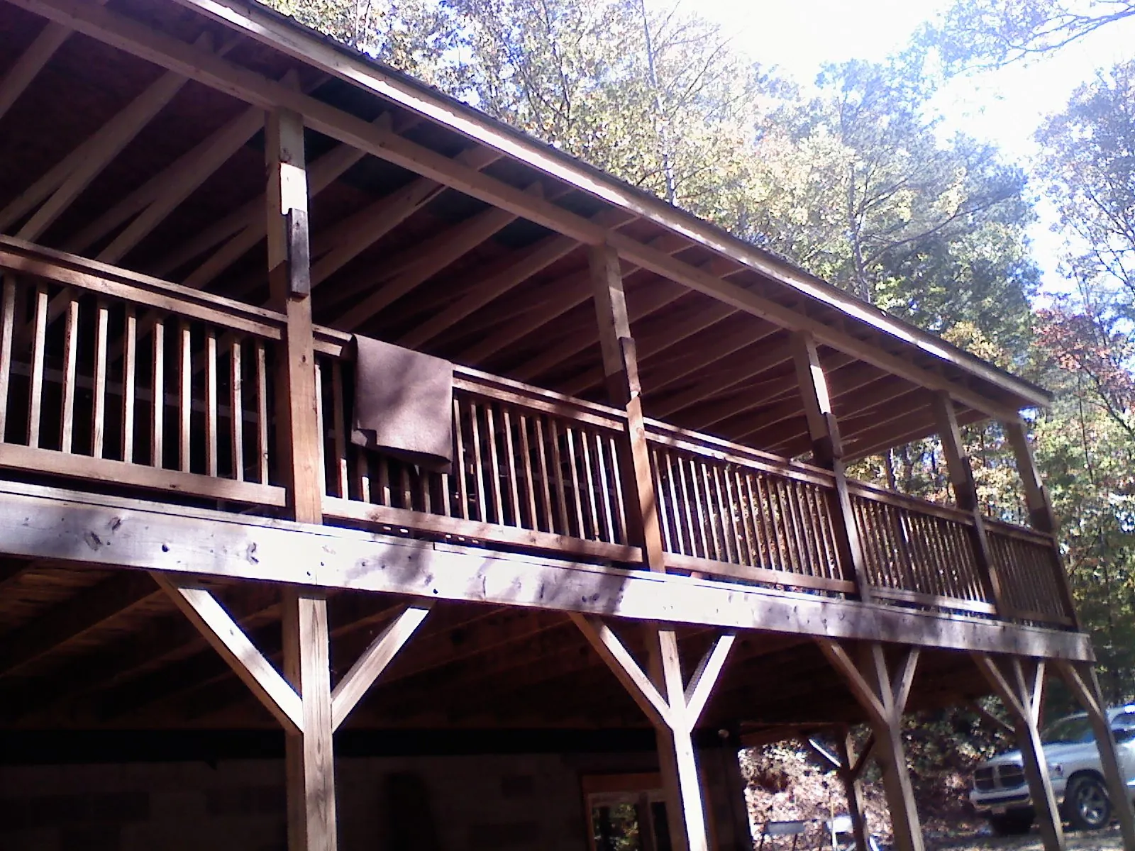 Timber framing under a new elevated porch and deck — Roof Leak Repair in Wellesley Hills by Roofing Brothers